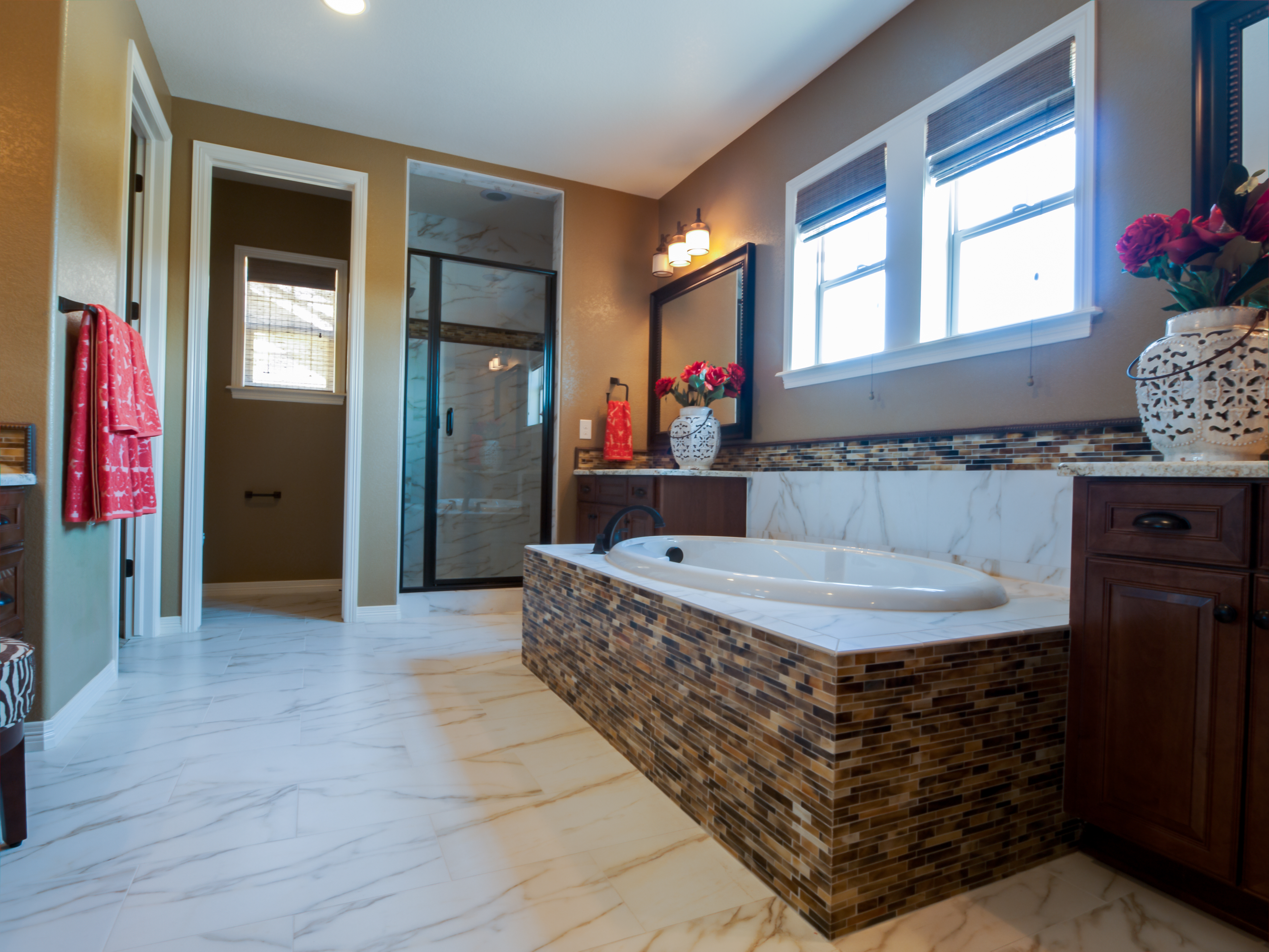 Bright bathroom with stylish tub and tile
